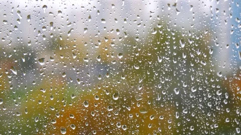 Raindrops on window. A drops of rain flows down the window. Drops of water 库存影片 121286351