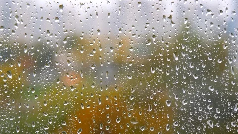 Raindrops on window. A drops of rain flows down the window. Drops of water 動画素材 121286457