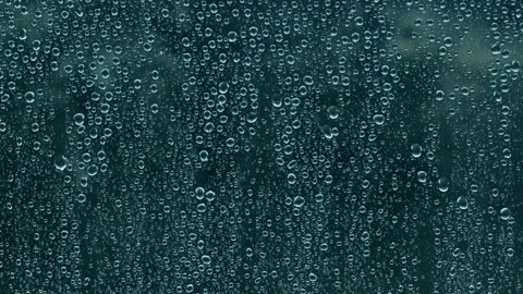 Raindrops on window during heawy rain,  Full HD 23.976fps Stock Footage 311758158