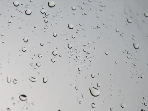 Raindrops on the window during rain Stock Photos
