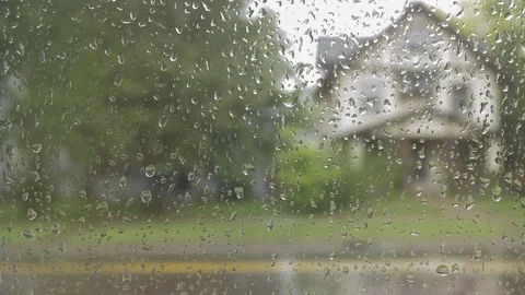 Raindrops on a Window Stock Footage 84030877