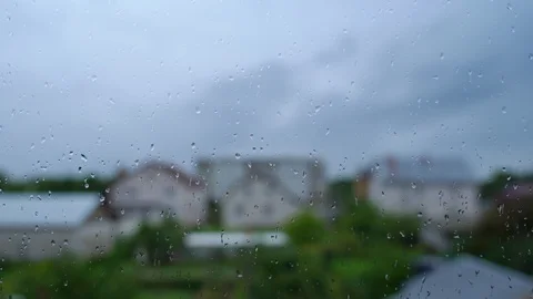 Raindrops on a Window Stock Footage 129589178