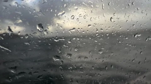 Raindrops on the window Stock Footage 303922140