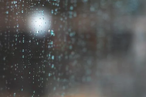 Raindrops on a window glass, background concept Stock Photos