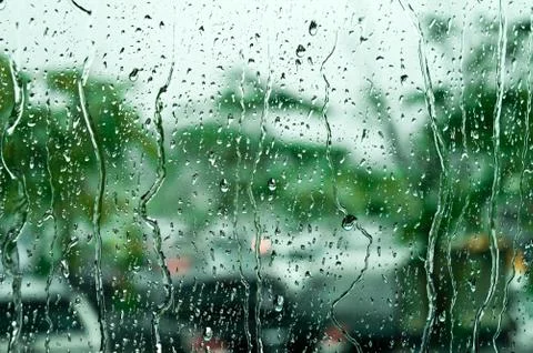 Raindrops on window glass, background Stock Photos