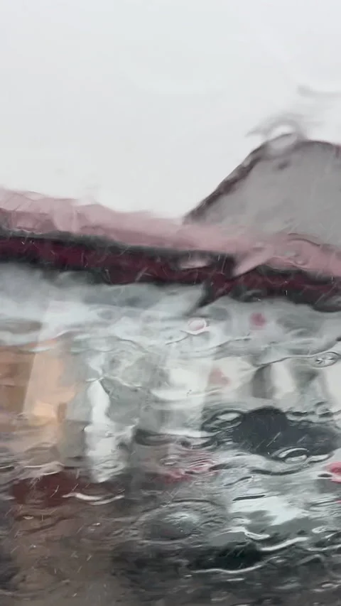 Raindrops On Window Glass With Blurred City Background Stock Footage 340903586