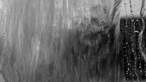 Raindrops on window glass Stock Footage 129970538