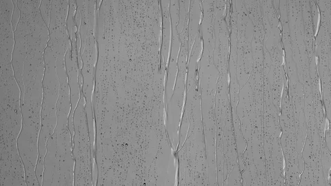 Raindrops on window glass Stock-Footage 129970647