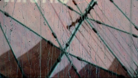 Raindrops on window glass Stockbeeldmateriaal 129970653