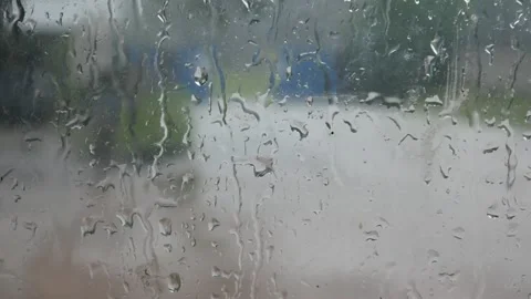 Raindrops on the window glass Stock Footage 306779566