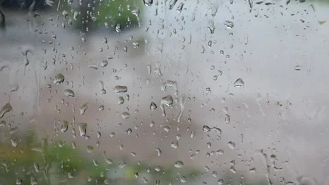 Raindrops on the window glass Stock Footage 306779571
