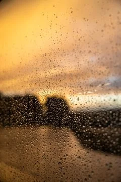 Raindrops Window Glass Orange Sunset Bokeh Abstract Vertical Photo Stock Photos