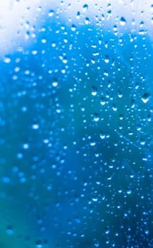 Raindrops on the window glass Stock Photos