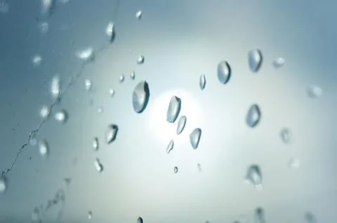 Raindrops on the window glass Stock Photos