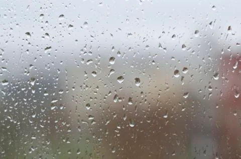 Raindrops on the window glass Stock Photos