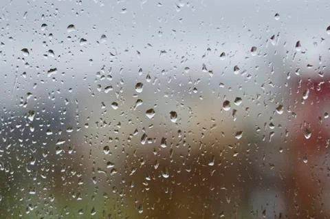 Raindrops on the window glass Stock Photos