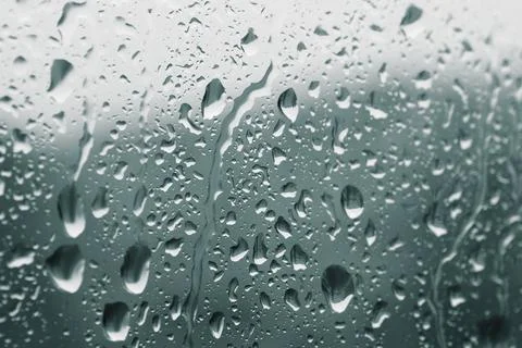 Raindrops on the window glass Stock Photos