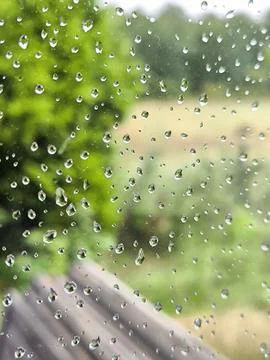 Raindrops on the window glass Stock Photos