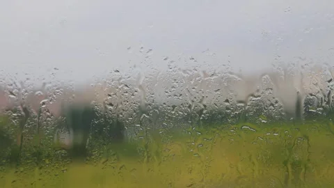 Raindrops on the window glass. Raindrops on the window pane. Stock Footage 246592673