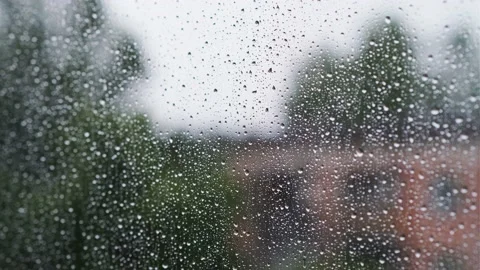 Raindrops on window glass surface, close-up. Stockbeeldmateriaal 201316540