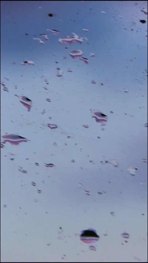 Raindrops on Window Glass - Vertical 4K 스톡 동영상 336340116