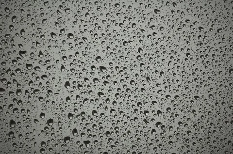 Raindrops in a window. Horizontal shot Stock Photos