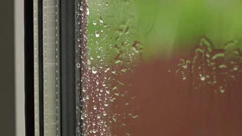 Raindrops on the window of the house, close-up Stock Footage 130663752