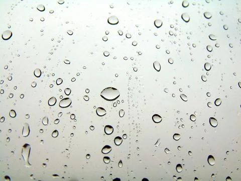 Raindrops on a window - house Stockfoto's