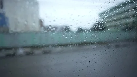 Raindrops on the window from inside the car Stock Footage 258884231