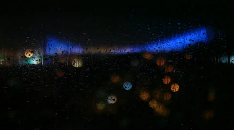 Raindrops on Window at Night 2 Stock Footage 34524420