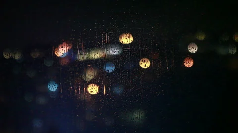 Raindrops on Window at Night Stock-Footage 34524401