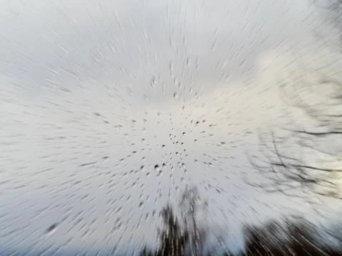 Raindrops on a window pane, on a background of heavily cloudy sky, Stock Photos