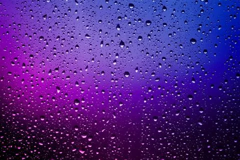 Raindrops on a window pane Stock Photos