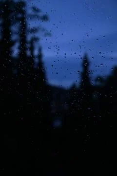 Raindrops on window pane Stock Photos