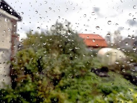 Raindrops on the window pane Stock Photos