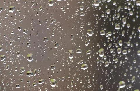 Raindrops on a Window Pane Stock Photos