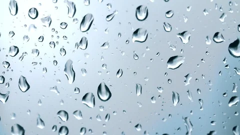 Raindrops on a window pane in slow motion Stock Footage 93782467