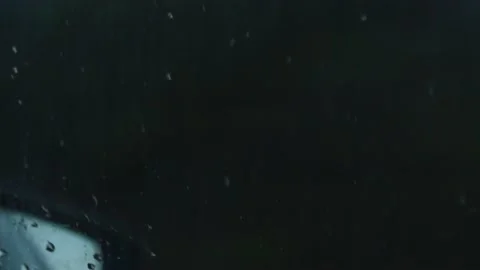 Raindrops on the window of the passenger seat Stock Footage 239014137