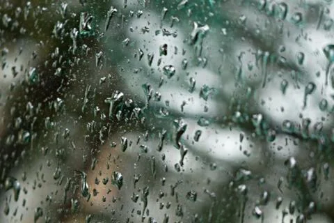 Raindrops on the window. Stock Photos
