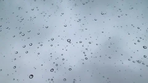 Raindrops on the window, rain on the glass, drops of water on the glass Stock Footage 147256117