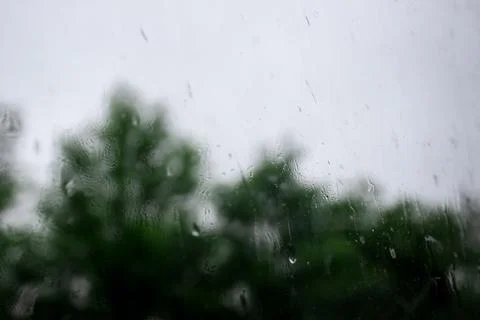 Raindrops on window , rainy day. Background raindrops. blurred background Stock Photos