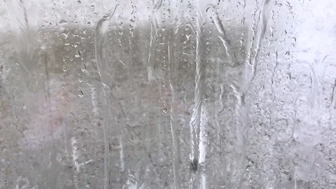 Raindrops on window in rainy weather Stock Footage 120021369
