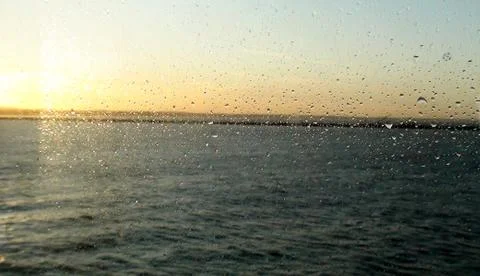 Raindrops on window of ship 스톡 사진