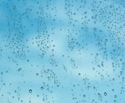 Raindrops on window of a ship at sea with clouds Stock Photos