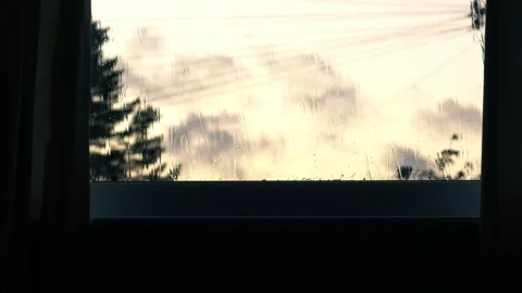 Raindrops on window in storm on view from home Stock-Footage 273503594