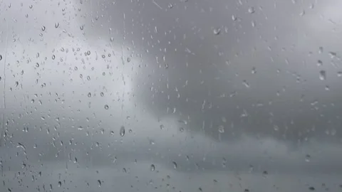 Raindrops in the window, stormy dark weather Stock Footage 136032052