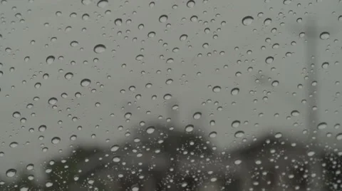 Raindrops on window water streams past Видео 52124874