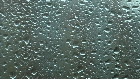Raindrops on a windowpane Stock Footage 78504216