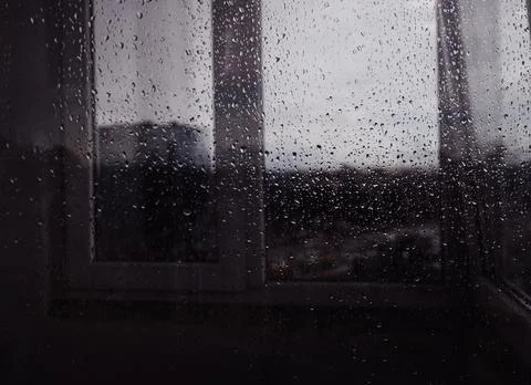 Raindrops on window's glass Stock Photos