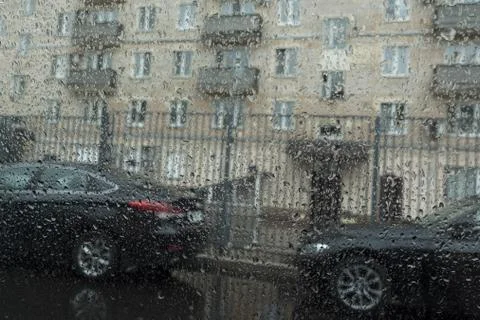 Raindrops on the windscreen of a car Stock Photos